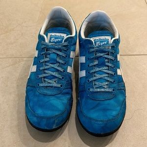 Onitsuka blue tie dye tennis shoes.